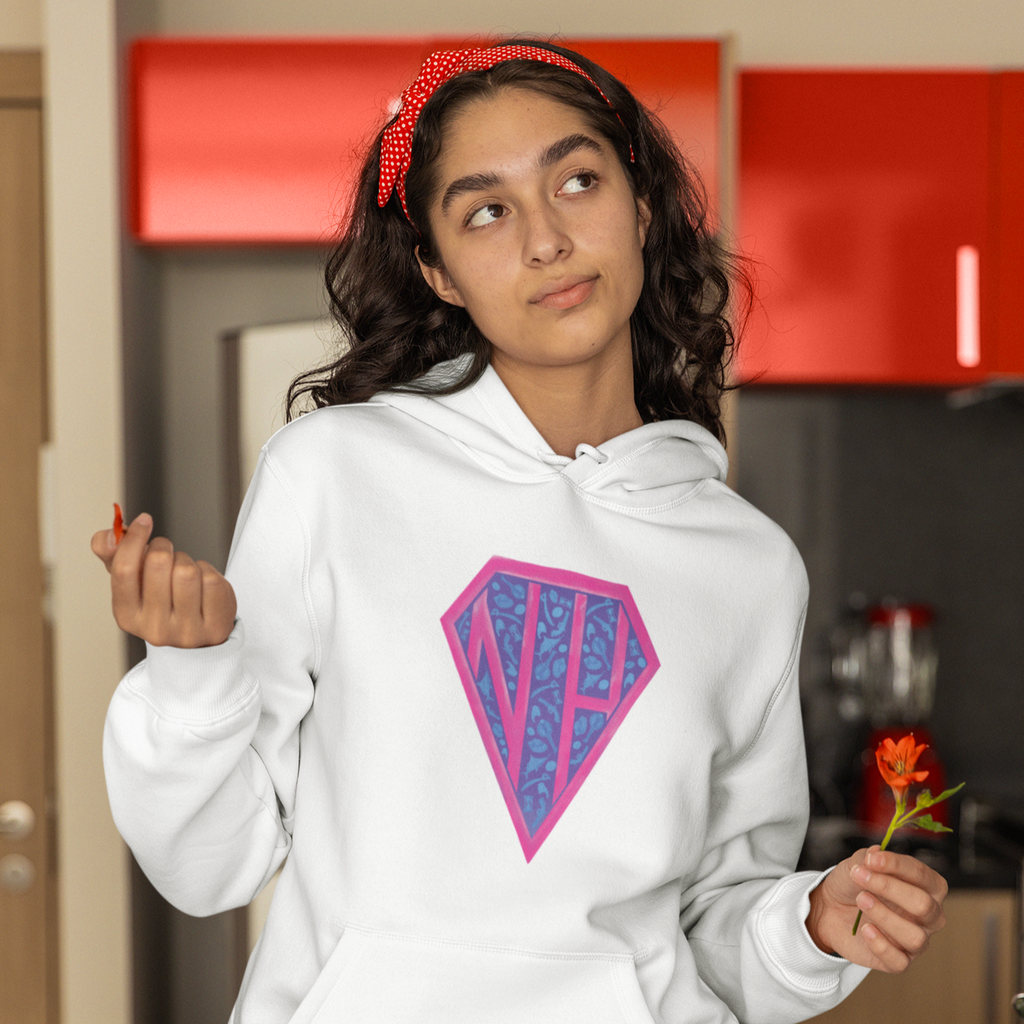 a woman wearing a white hoodie with the naptimehero logo on the chest.