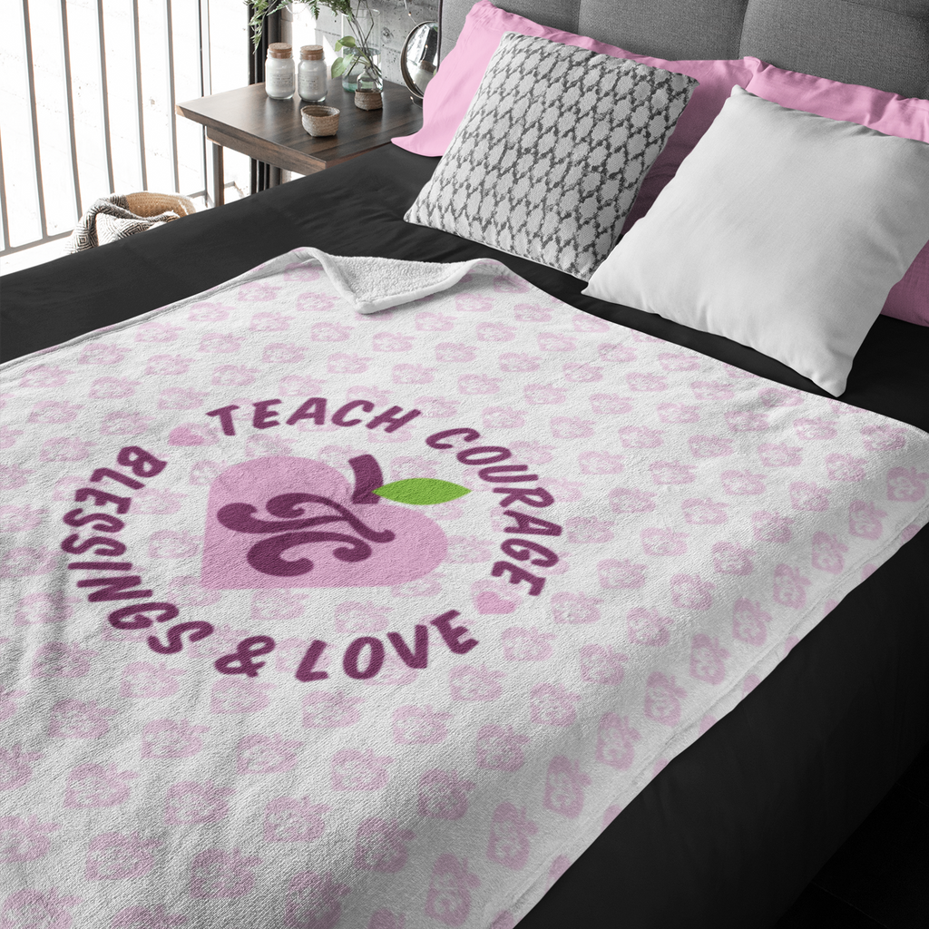 Blanket with TeachCourage Elementary design on bed