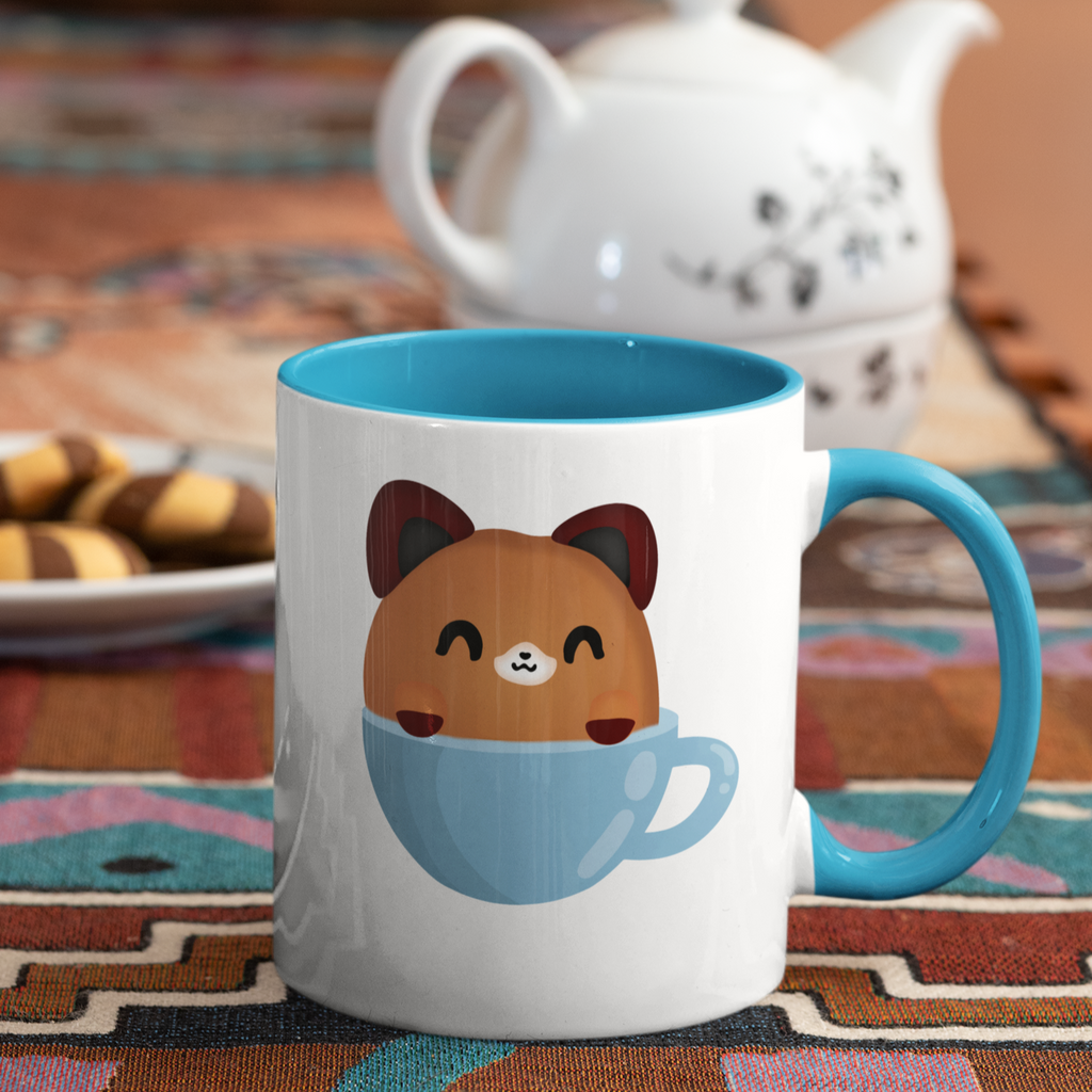 a mug with blue inside and blue handle with the trevor mug design from gingersnaps67