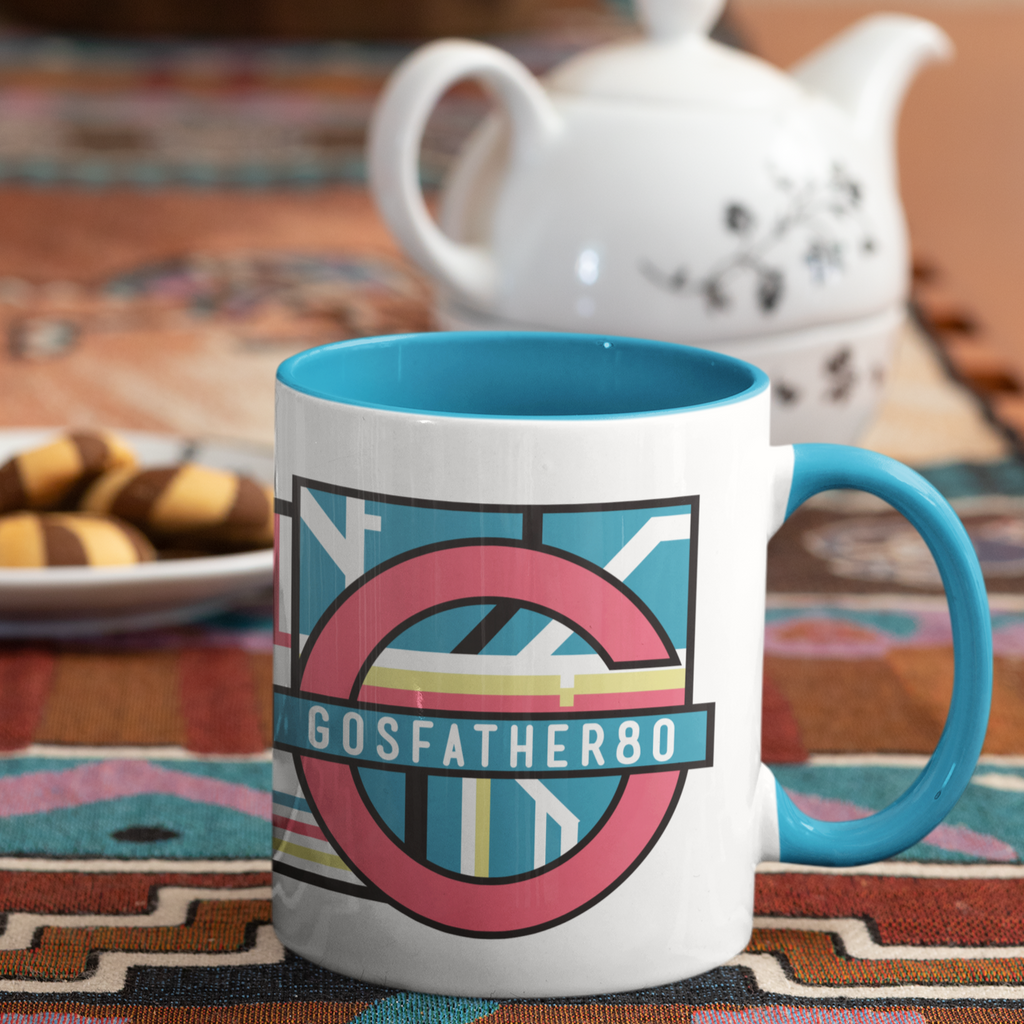 a mug with blue rim and blue handle and the Gosfather80 underground crest on it.