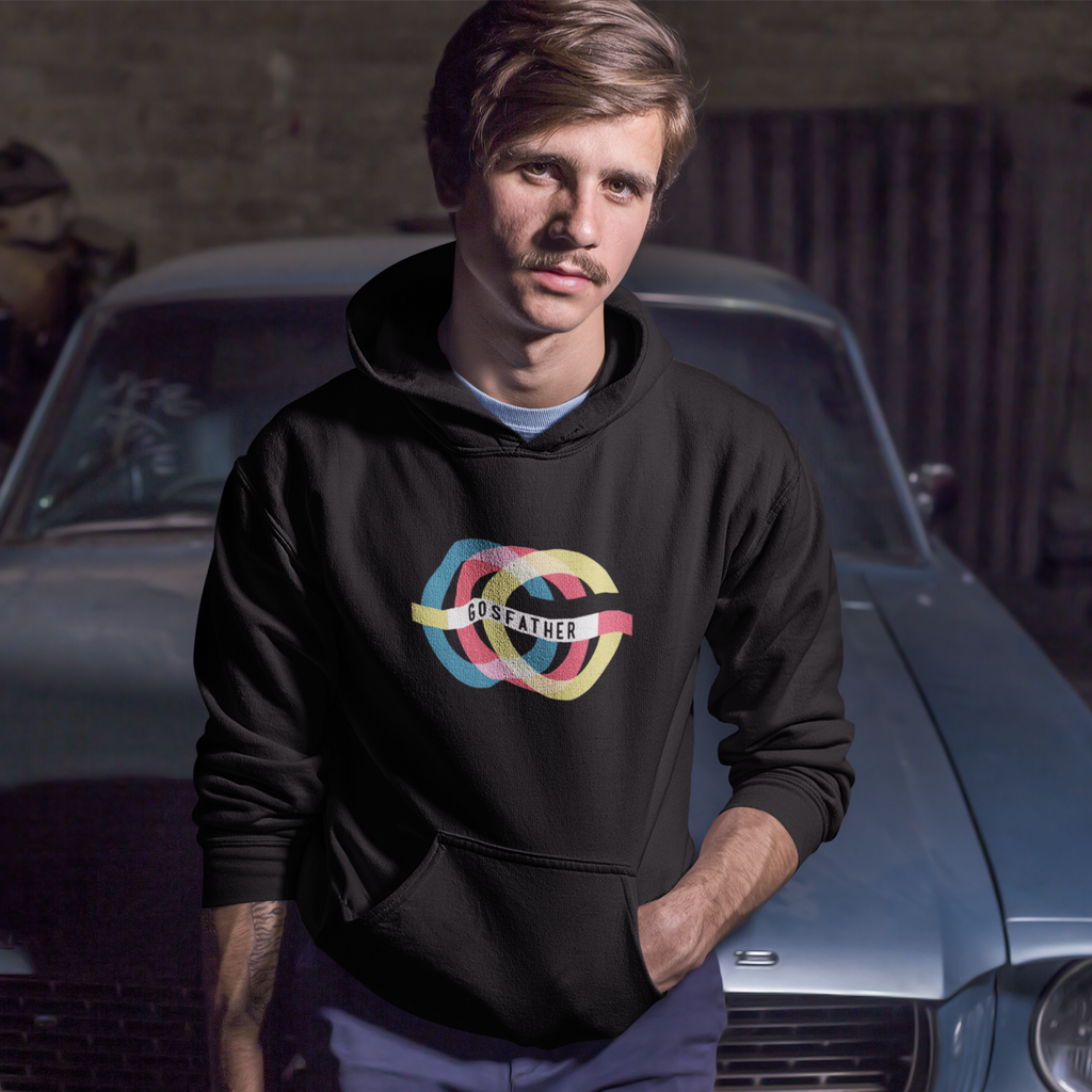 a man sitting on the hood of an old car wearing a black hoodie with the retro logo from gosfather