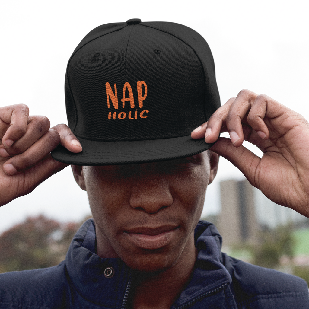 a man wearing a black snapback with the napholic design from kisogoplays