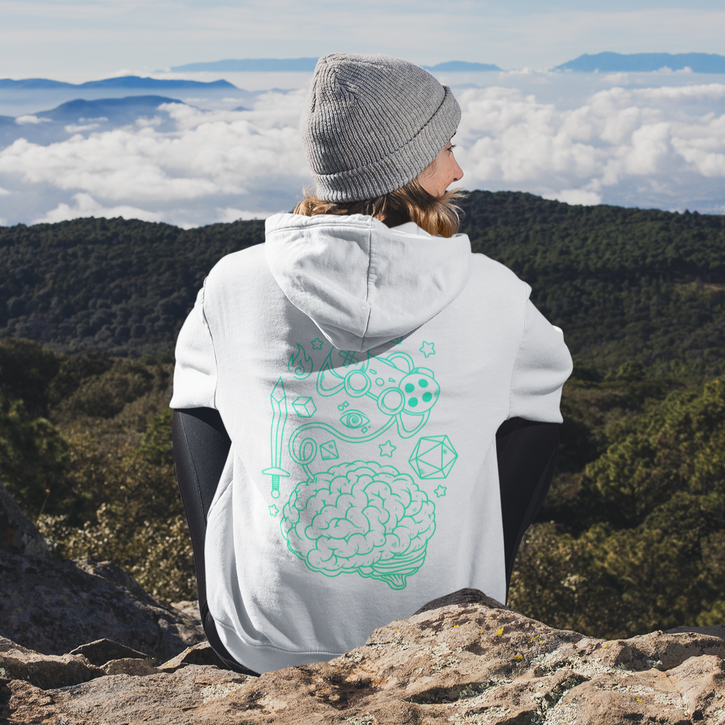 a woman sitting on top of a mountain wearing a white hoodie with the guardians MH gamer design on it.