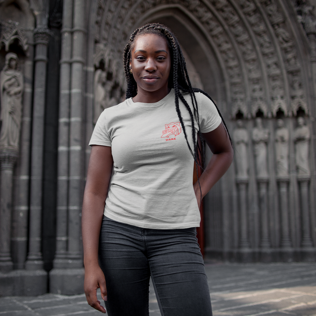 a woman standing in front of a cathedral wearing an athletic heather haunter dark tshirt from GeorgeWAmbush