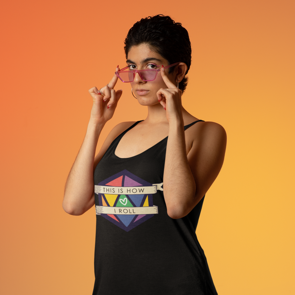a woman wearing a tank top with the Pride D20 design from CalyxCreative