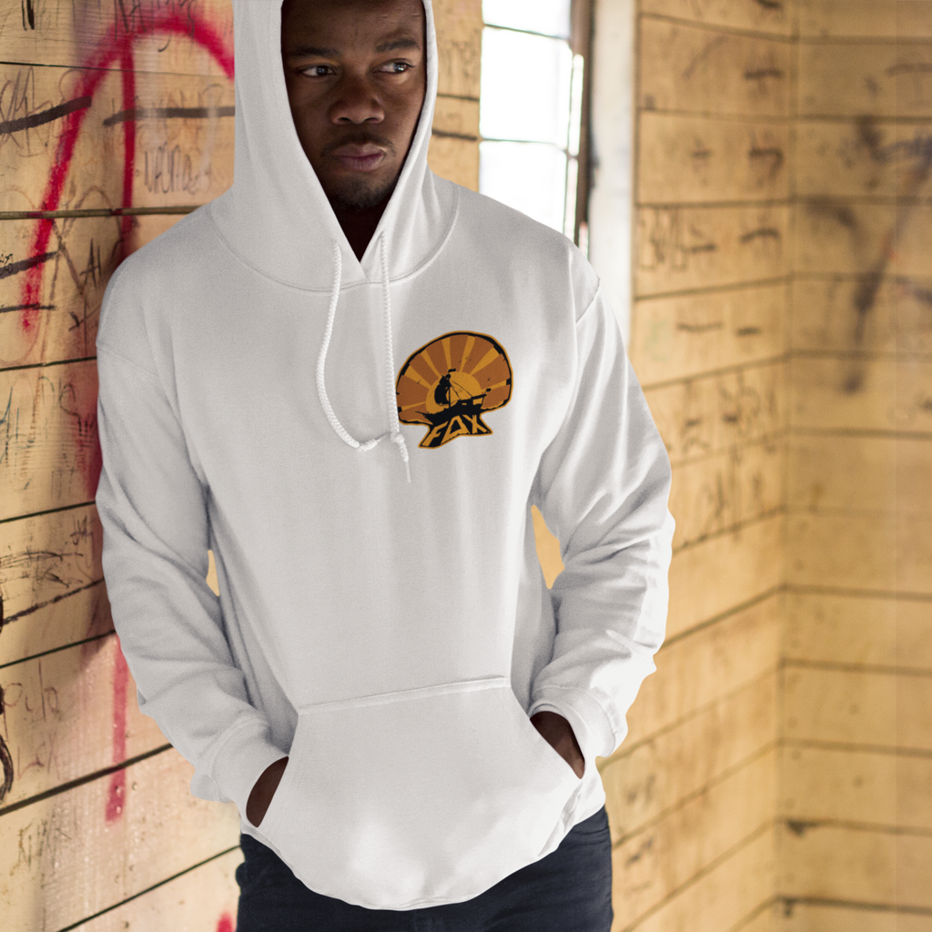 a man leaning against a wood wall wearing a white hoodie with the foxdie sunset design.
