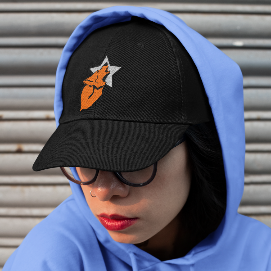 Woman wearing a blue hoodie and the wolfstar76 logo dad hat