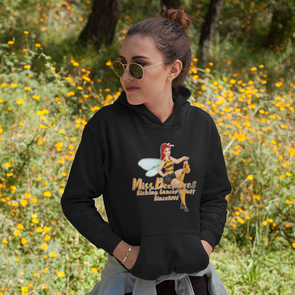 Woman wearing black hoodie with Miss_Beehave8 Pinup design