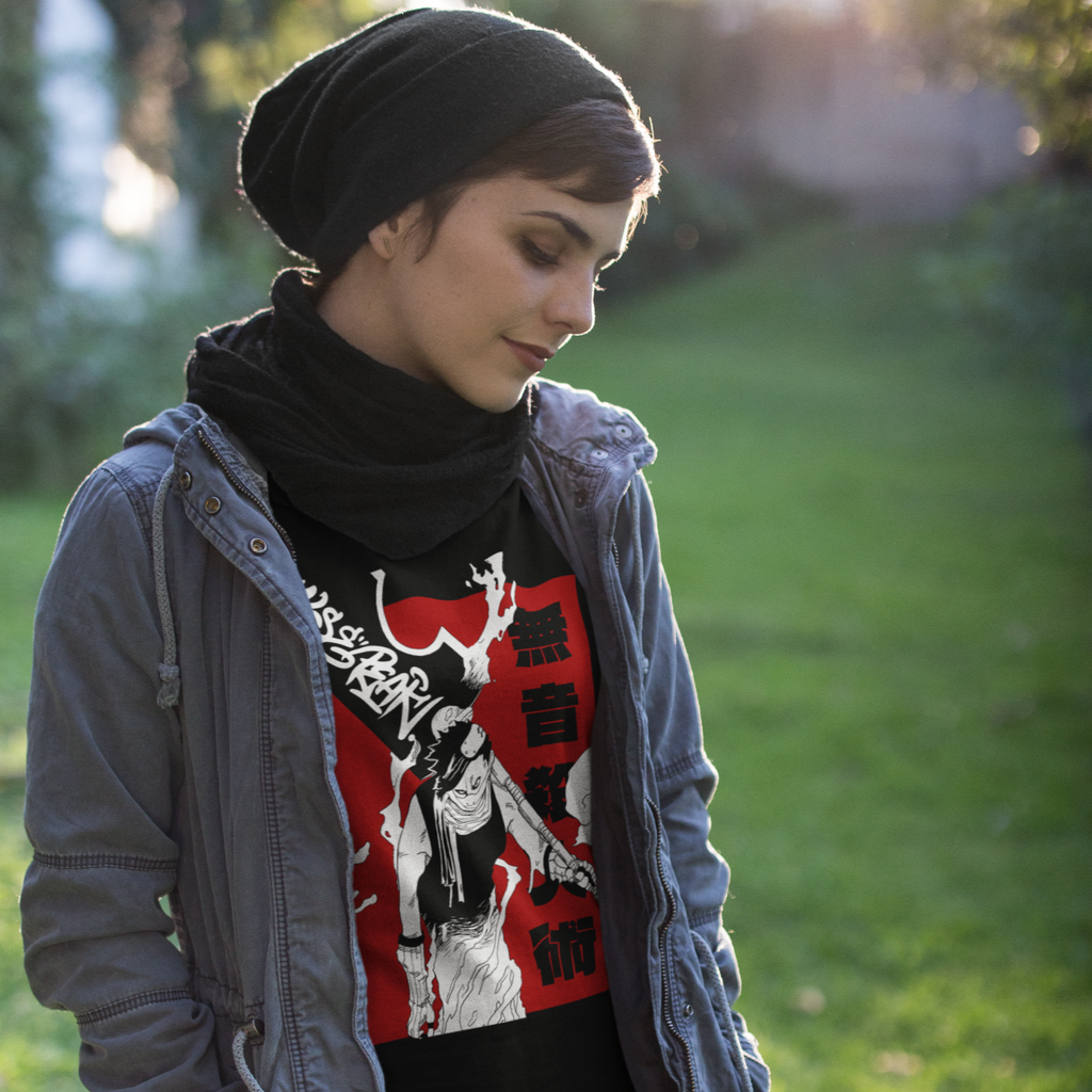 a woman wearing a beanie, scarf, jacket and a black tshirt with the silent killer design from Falsepeak_