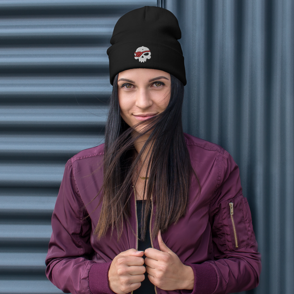 Woman wearing black beanie with Skull design