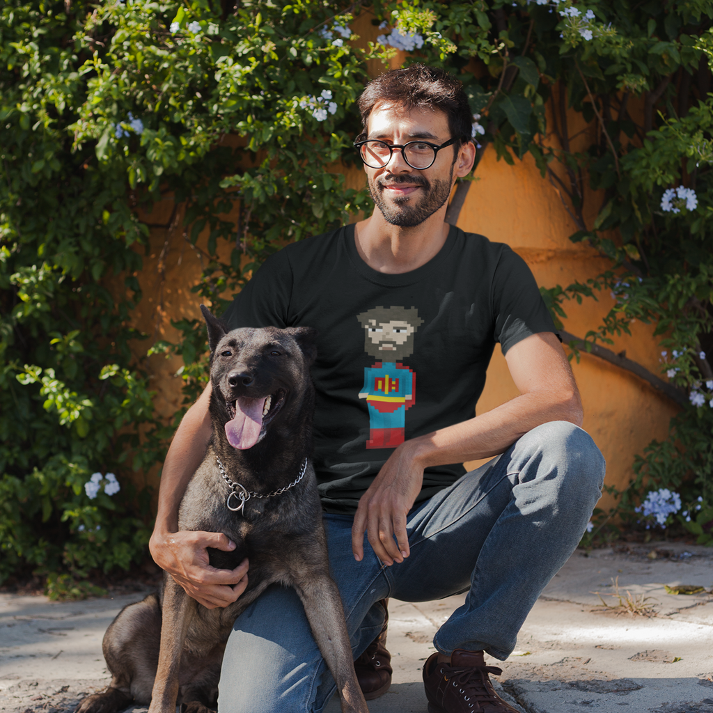a man with glasses kneeling next to his dog wearing a black 8-bit naptimehero tshirt