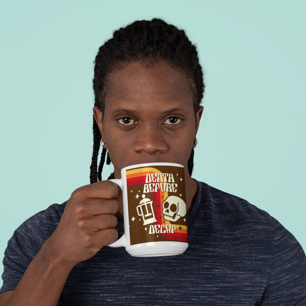 A man drinking coffee out of a 15oz death before decaf mug