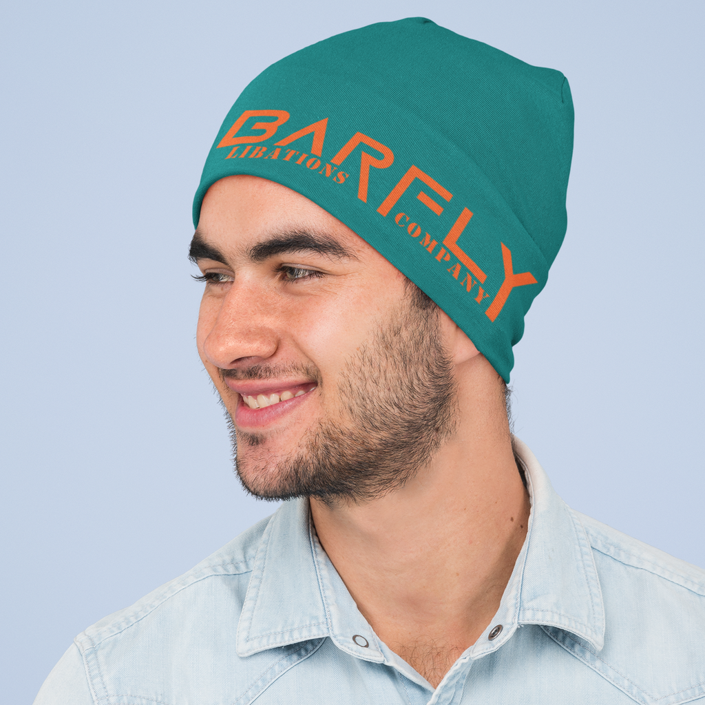 a man wearing a green beanie with the Barfly Libations Company logo from kisogoplays