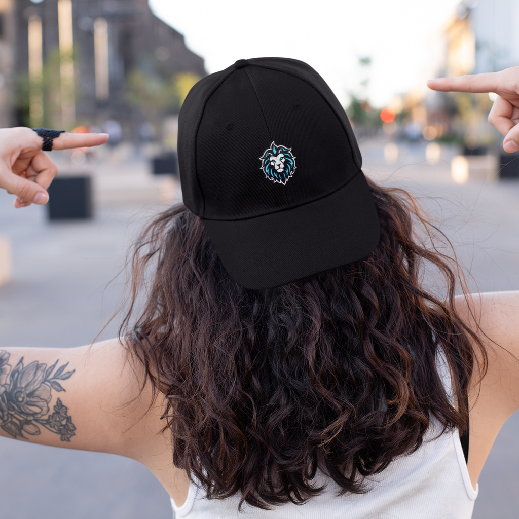 Woman wearing black dad hat with Leo emblem