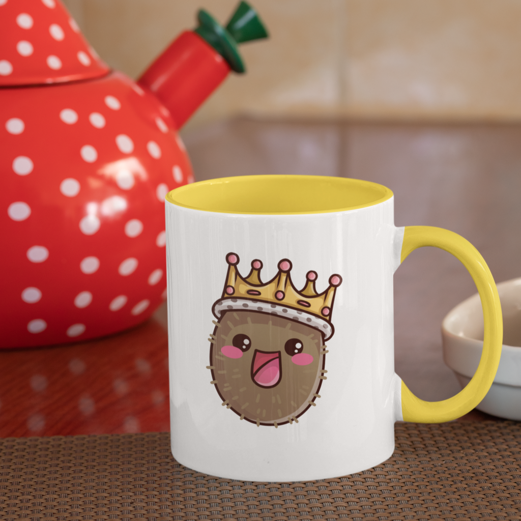 a mug with a yellow rim and handle and the potato desing from TizzyTam