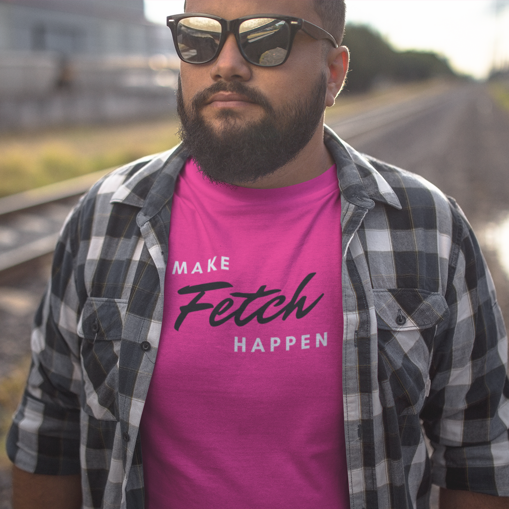 Man wearing pink t-shirt w/ Make Fetch Happen design