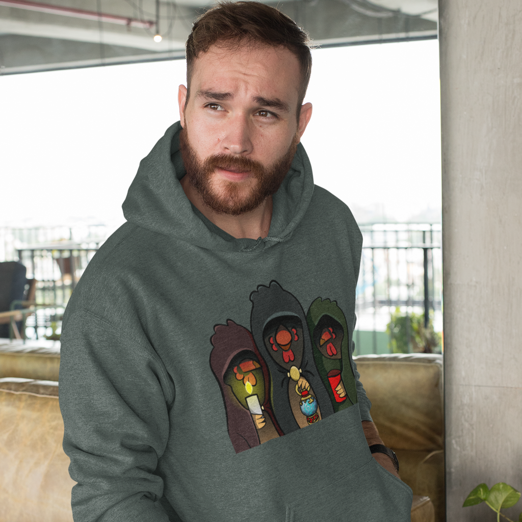 a man leaning up against a couch wearing a heather forest hoodie with the Cult of Chickens design from Mother0fChickens