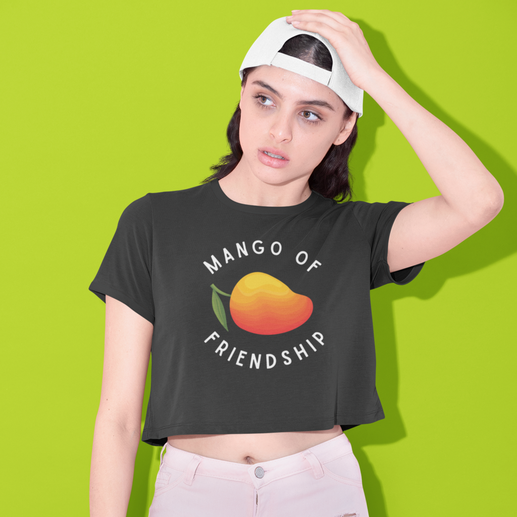 Woman wearing black crop-top tee with Mango of Friendship design