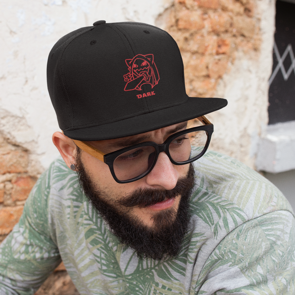 a man with glasses, wearing a balck snapback with the dark design from GeorgeWAmbush