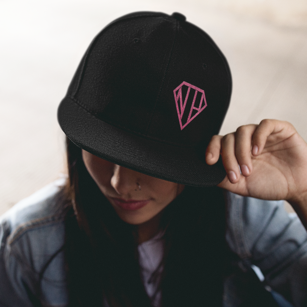 a woman wearing a black snapback with the NaptimeHero logo