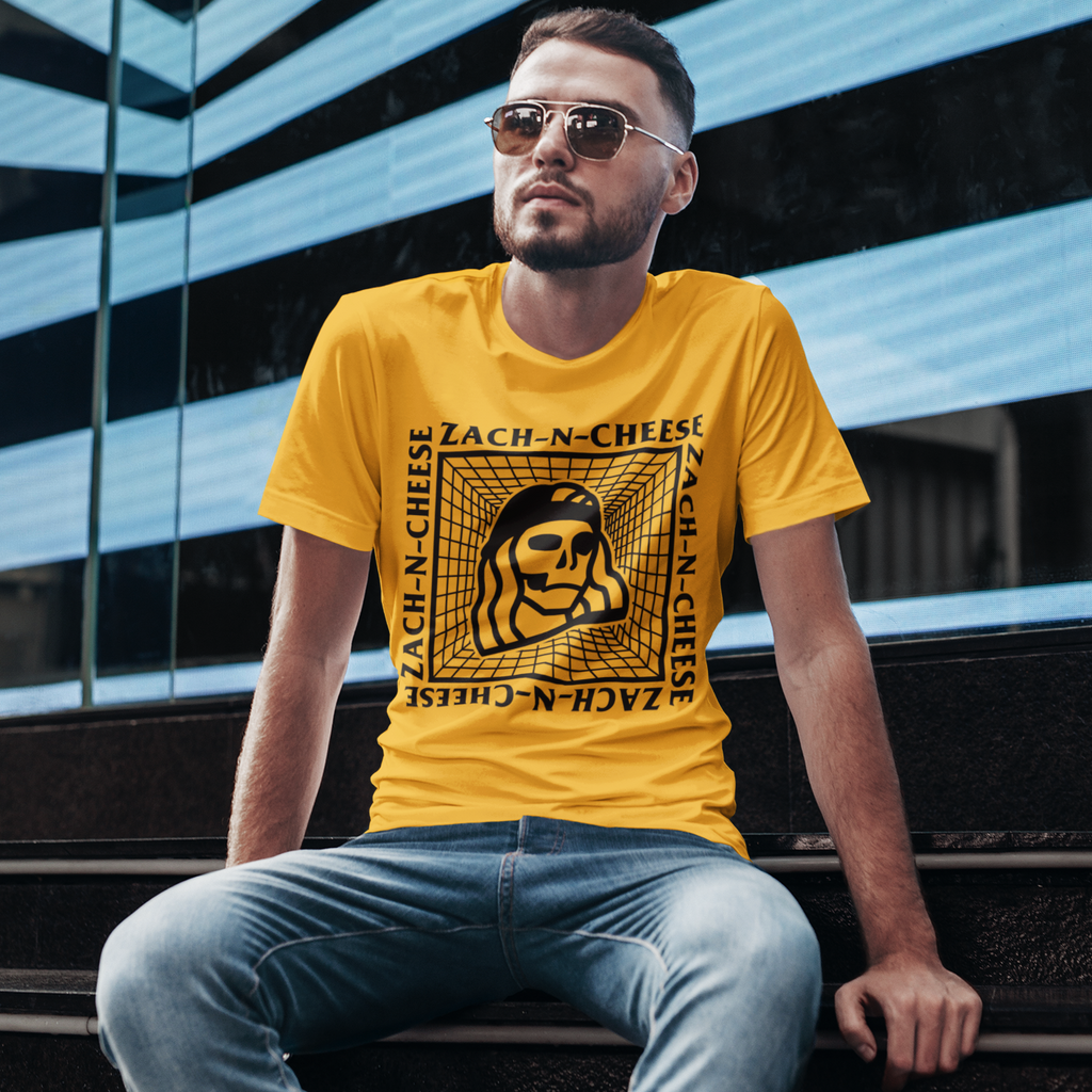 Man wearing gold short-sleeve tee with ZachNCheese Cube Lines design