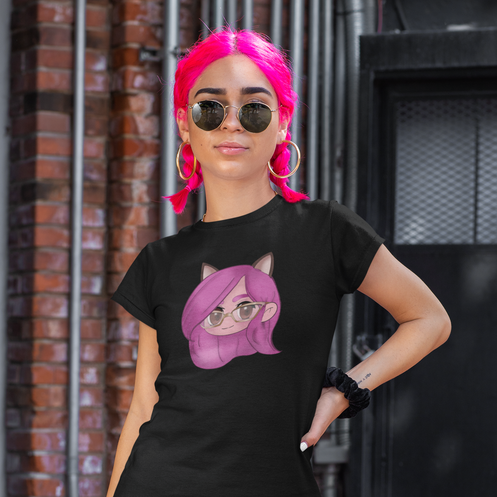 Woman with pink hair wearing a black tshirt with the TammyKitten Chibi design.