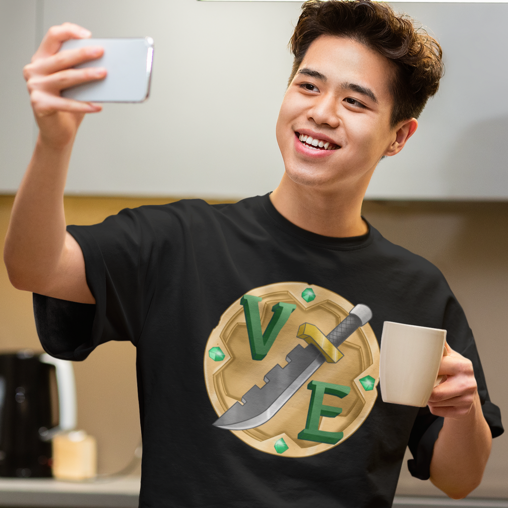 a man taking a selfie wearing a black VoicesExtremeus logo tshirt