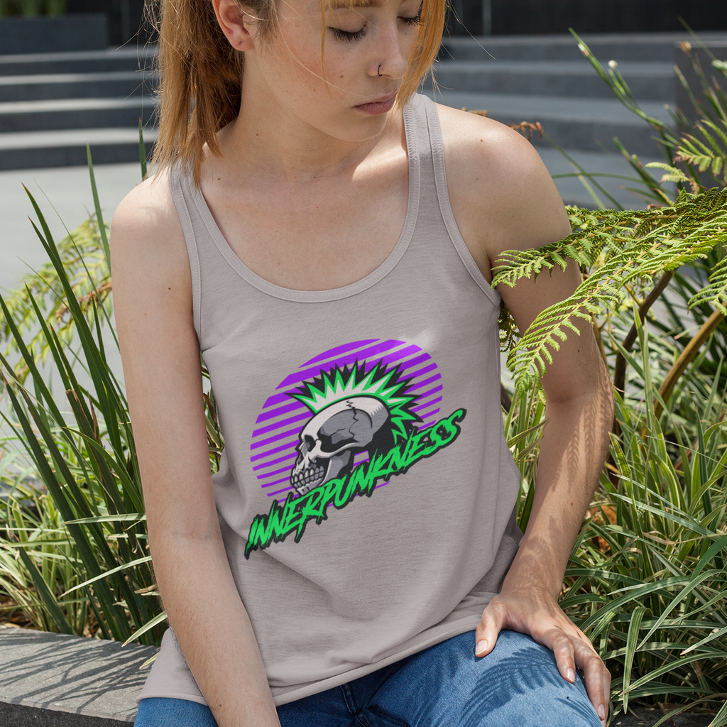 a woman wearing a unisex tank top with the 80s logo from innerpunkness