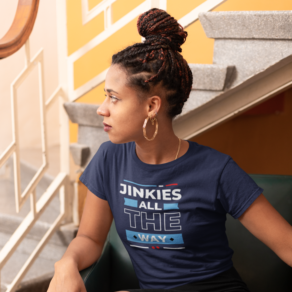 w woman sitting by a set of stairs wearing a navy Jinkies All The Way tshirt from aBlackSparrow