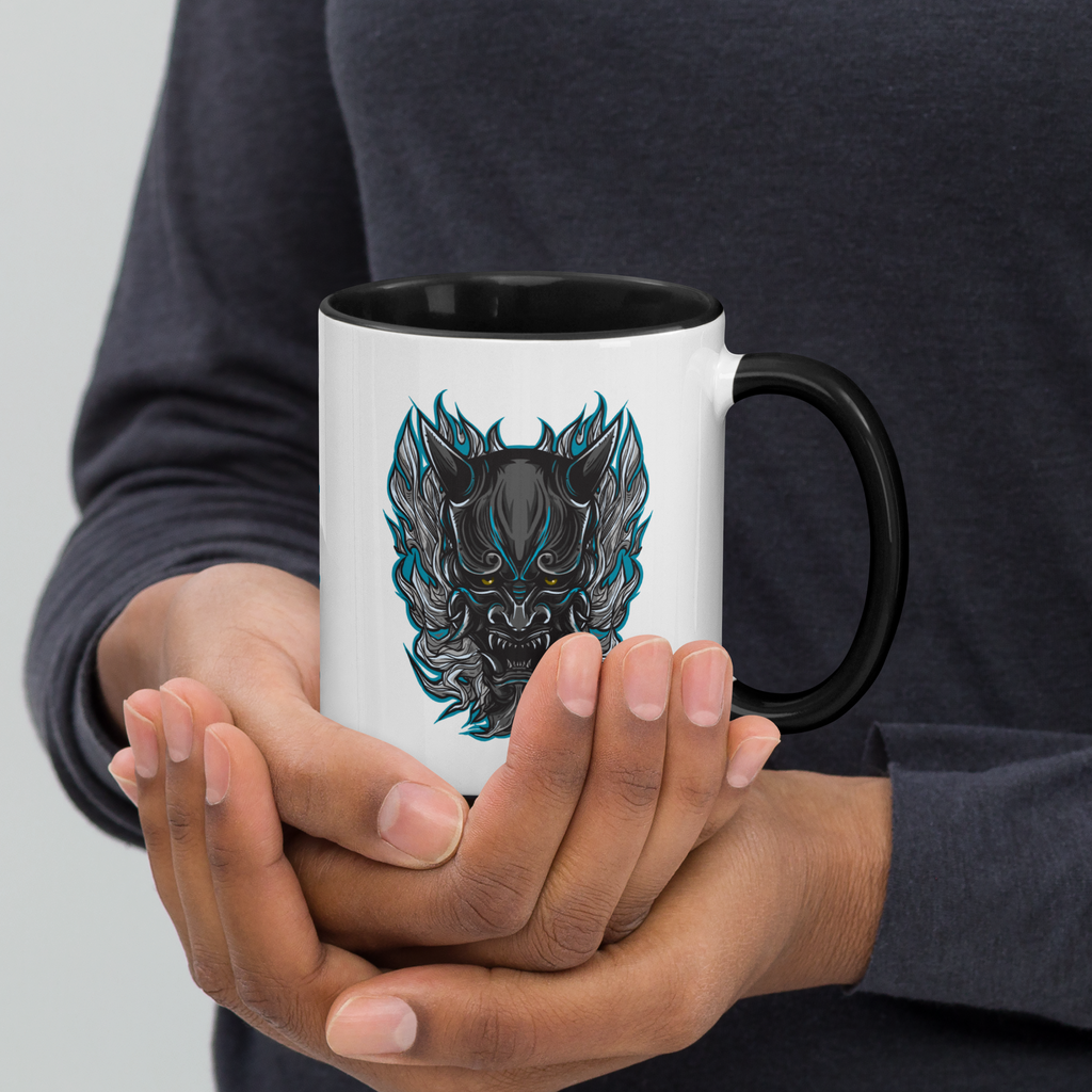 Person holding black/white mug with Dark Oni design