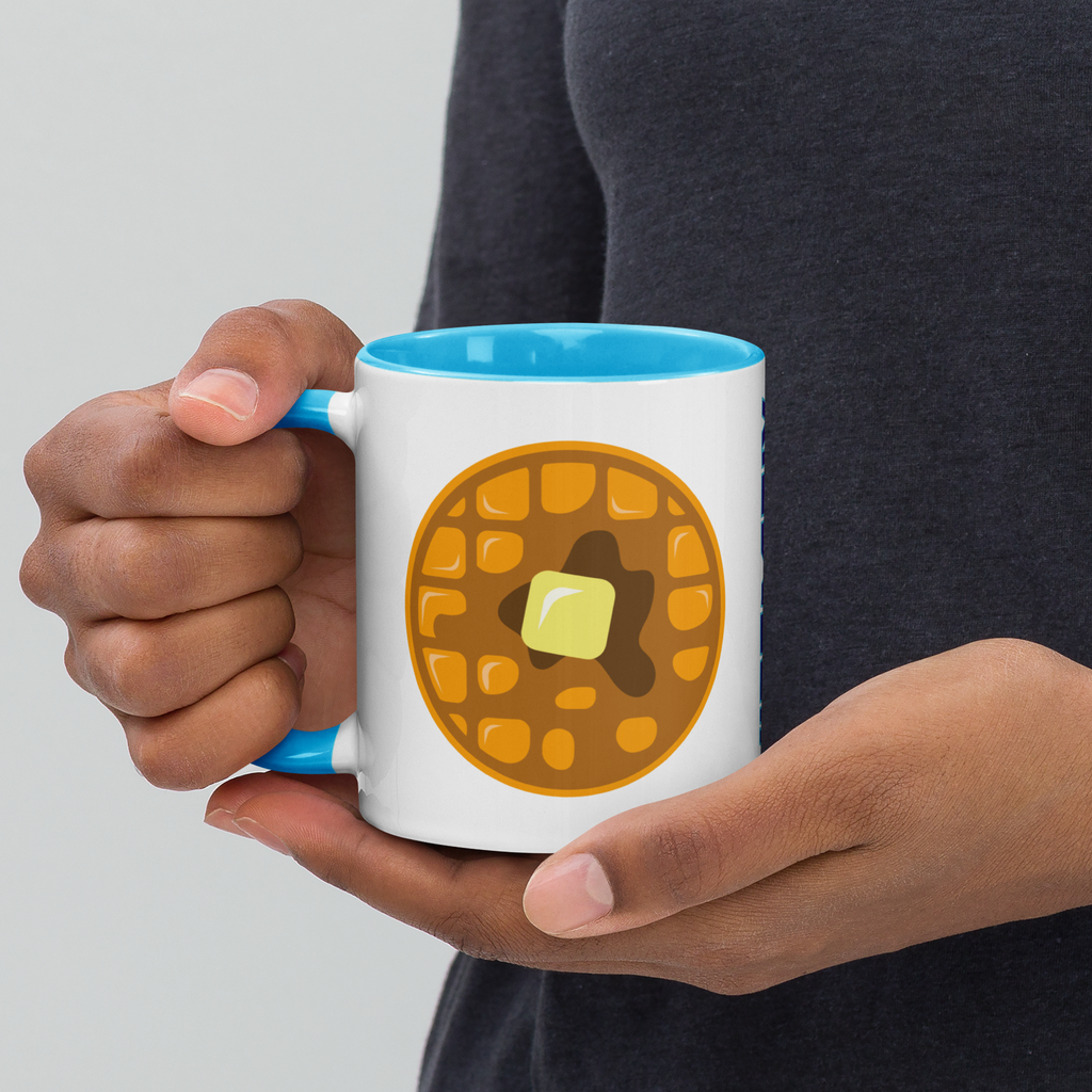 Person holding blue and white mug with Waffle design